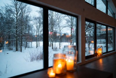 Winter view with candles glowing softly