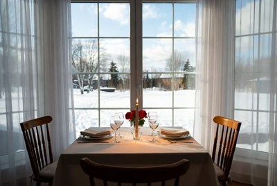 Cozy winter dining with snow views