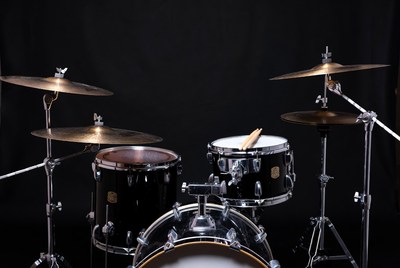 Drum set in a dark studio