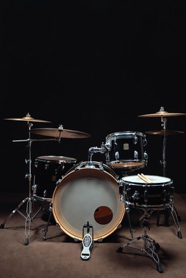 Black backdrop and drum kit setup