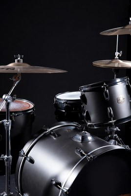 Classic drum set against black background