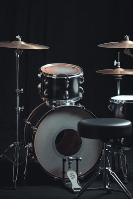 Simple black drum set in focus