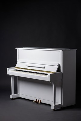 Elegant white upright piano in focus