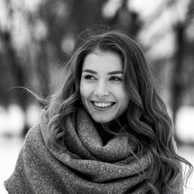 Woman smiling in winter scenery