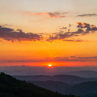 Sunset over mountain landscape in evening