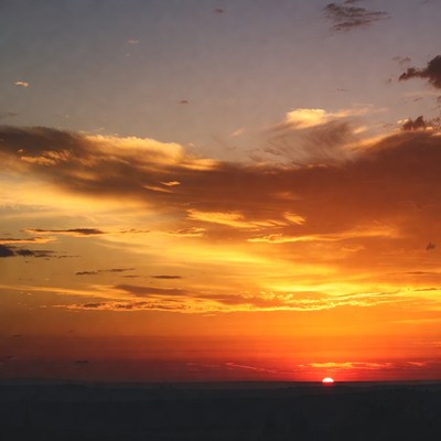 Sunset over open landscape