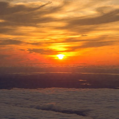 Sunset over clouds from airplane