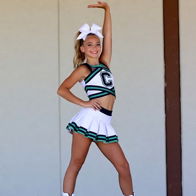Cheerleader posing during a routine