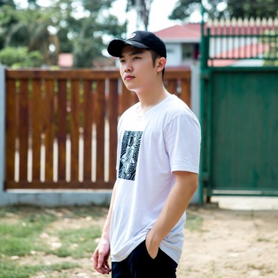 Person standing in outdoor area