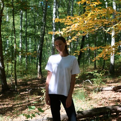 Woman in forest during autumn