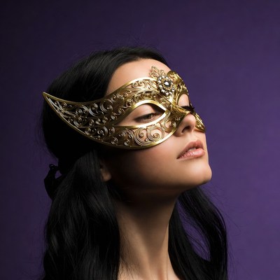 Woman wearing a golden mask