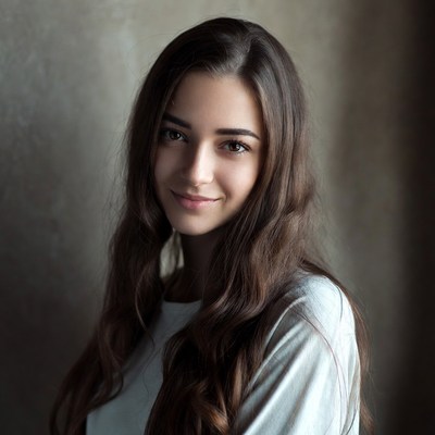 Young woman smiling in soft light