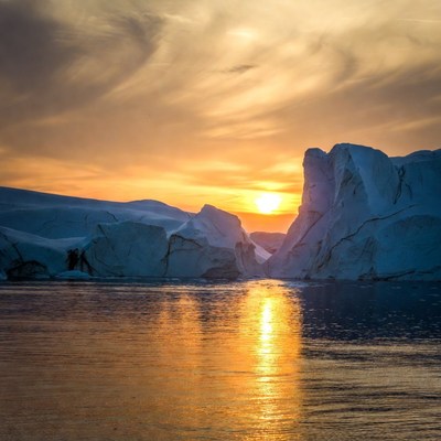 Sunset over glacier water