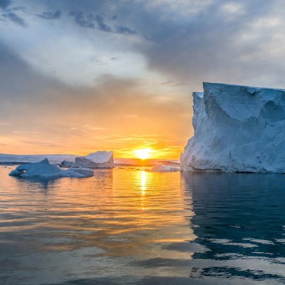Icebergs at sunset in the ocean