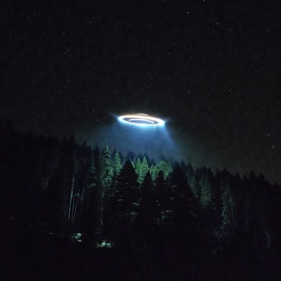 Ufo above forest at night