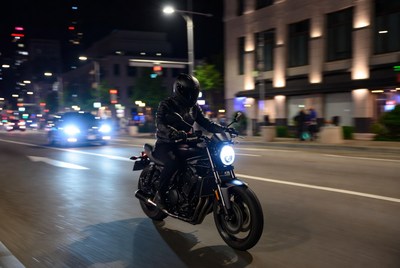 Motorcycle ride in city at night