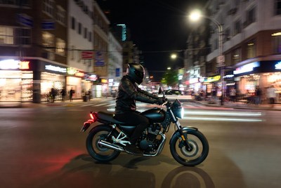 Rider on motorcycle at night
