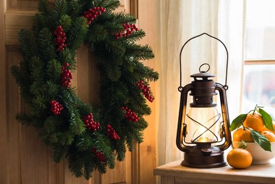 Lantern and wreath by the door