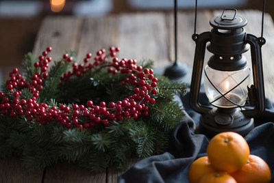 Holiday decorations with lantern and fruit