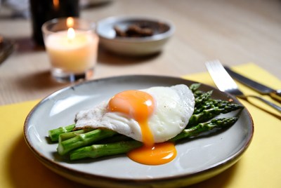 Egg and asparagus on a plate