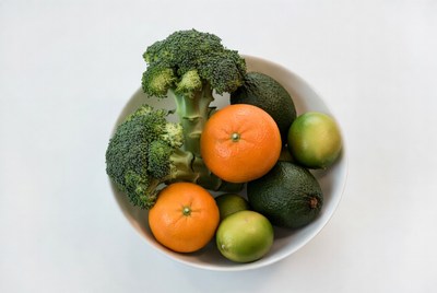 Fresh fruits and vegetables in a bowl