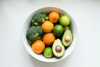 Bright fruits and vegetables in bowl
