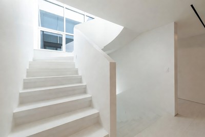 Stairs leading to bright space