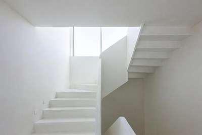 Stairs in a modern building with white walls