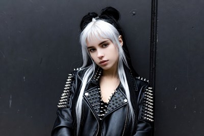 Young person with unique hair style outdoors