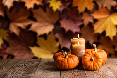Fall decor with pumpkins and candle