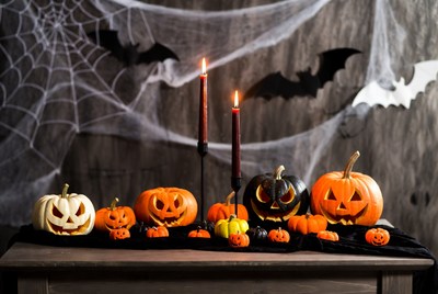Halloween pumpkin display with candles