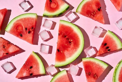 Watermelon slices on pink background