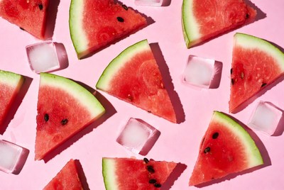 Summer fruit and ice arrangement on pink