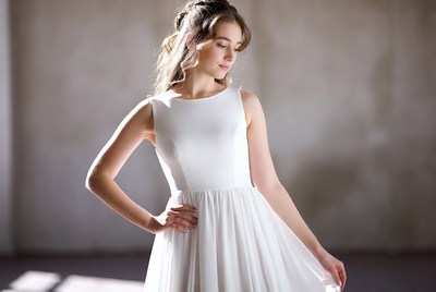 Young girl in simple white dress