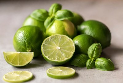 Limes and basil on kitchen counter