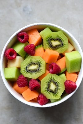 Fresh fruit bowl with kiwi and raspberries