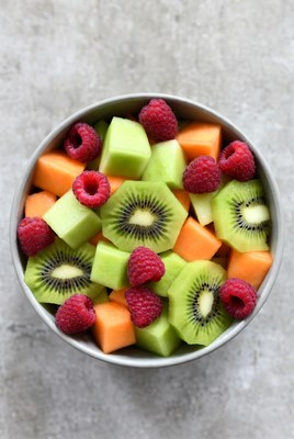 Fresh fruit bowl with berries and melons