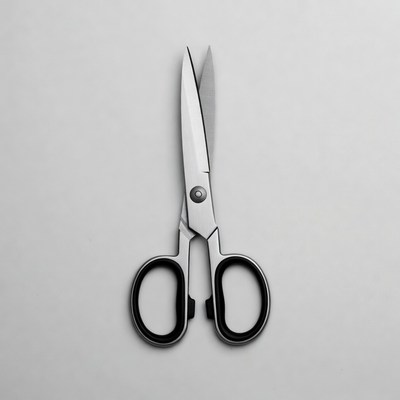 Scissors on a plain surface