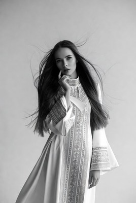 Woman in traditional dress posing gracefully