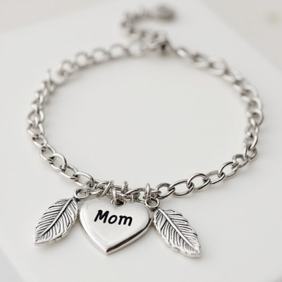 Silver bracelet with mom charm and leaves