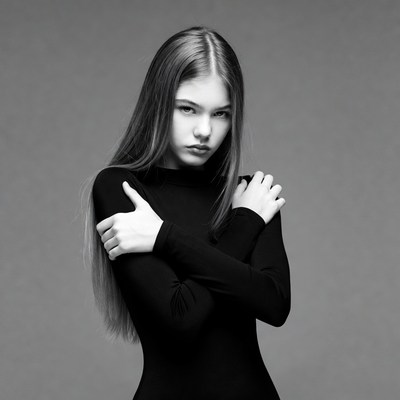 Young woman posing in black outfit