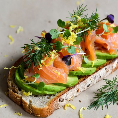 Fresh salmon on avocado toast