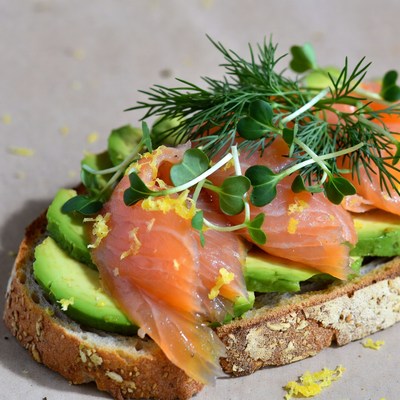 Bread topped with salmon and avocado