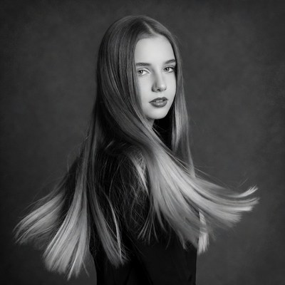 Young girl with long hair in motion