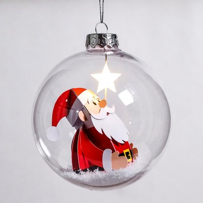 Santa in glass ornament with star light