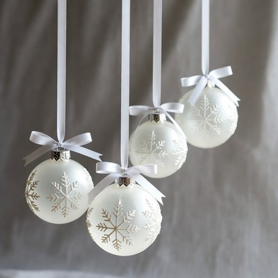 White ornaments hanging for winter