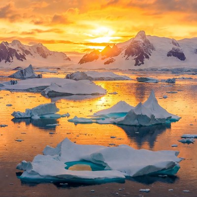 Sunrise over icy landscape in antarctica