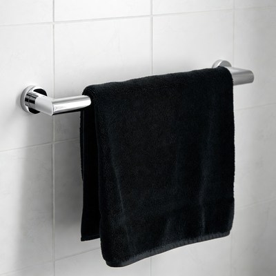 Towel hanging on a rack in a bathroom
