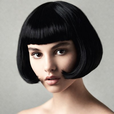 Woman with bob hairstyle in studio light