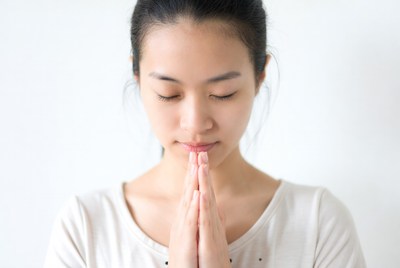 Young woman practicing mindfulness indoors